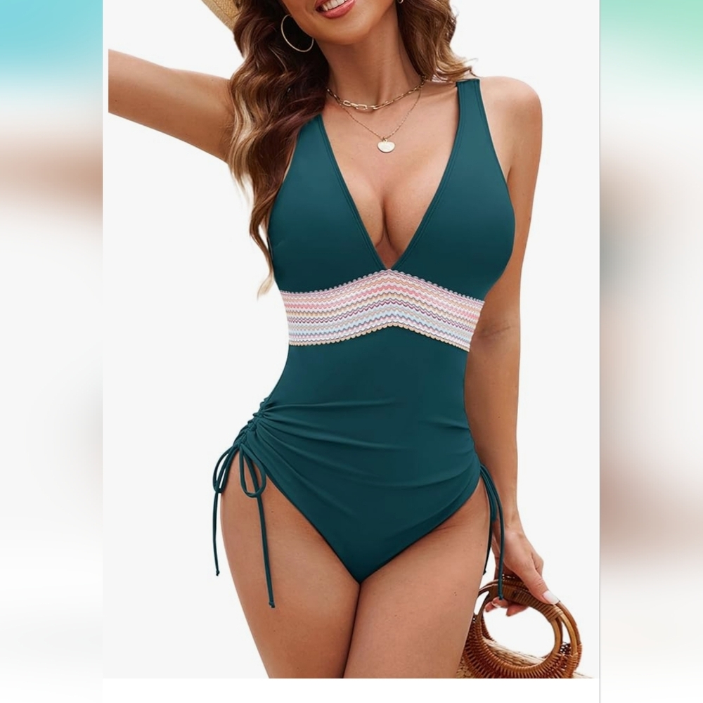 Worn once, super cute one-piece bathing suit size medium.